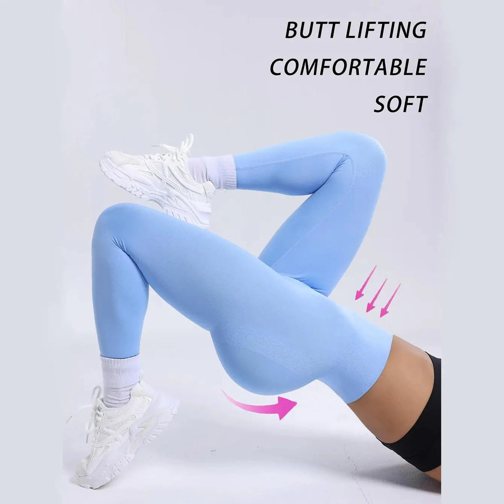 "Light blue seamless leggings for women fitness, featuring high waist and butt lifting support for yoga, jogging, and gym workouts."