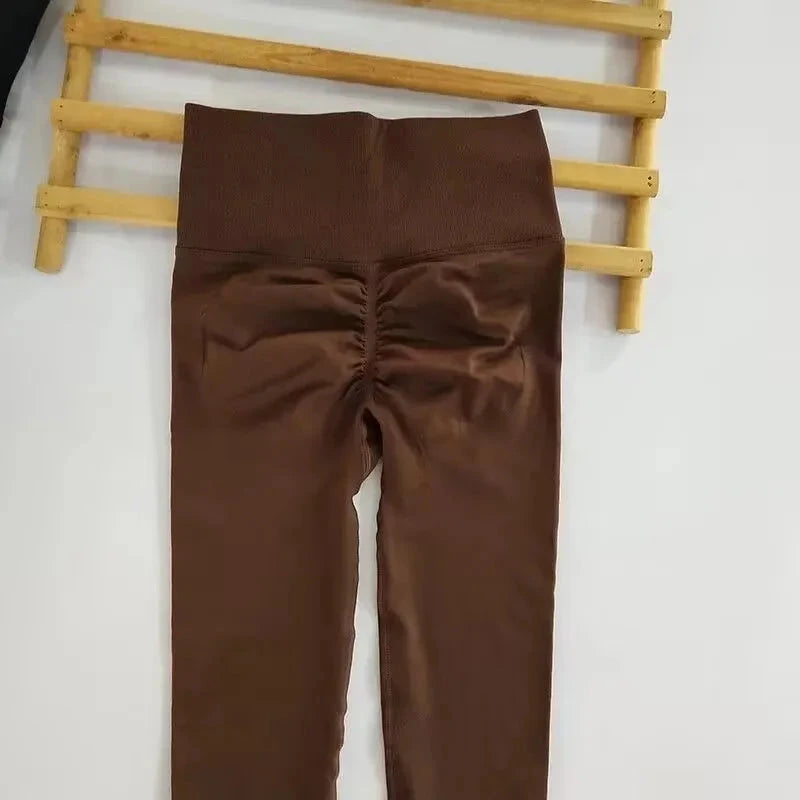 "Brown seamless leggings with ruched back detail, designed for women’s high waist push-up support during workouts and yoga sessions."