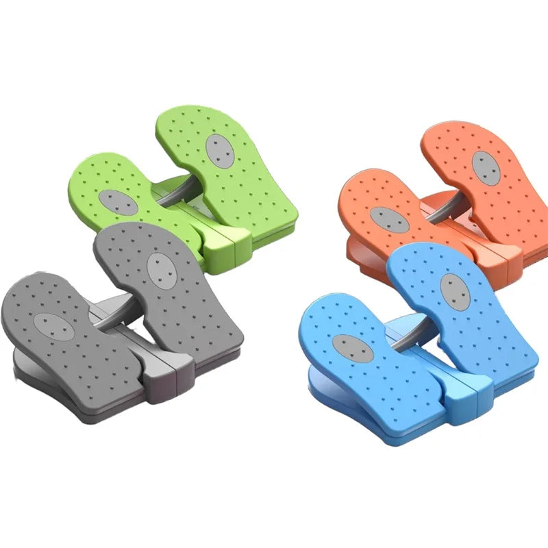 Four pairs of steppers in gray, green, orange, and blue, arranged on a plain white background.