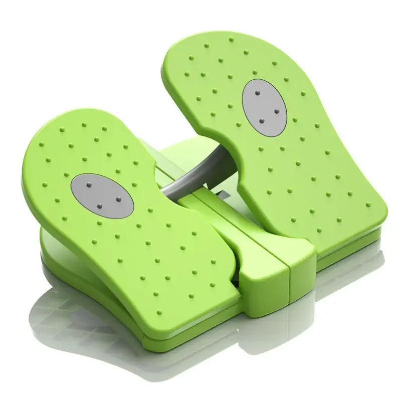 Green foot stepper device on a white background