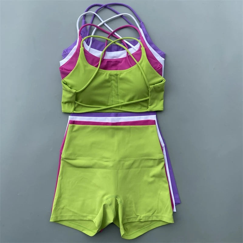 Colorful sports outfit with matching bra on a gray background