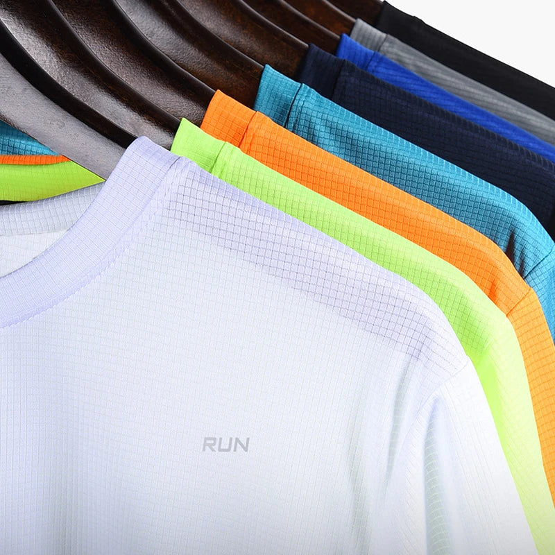 Colorful athletic shirts on hangers with 'RUN' text.