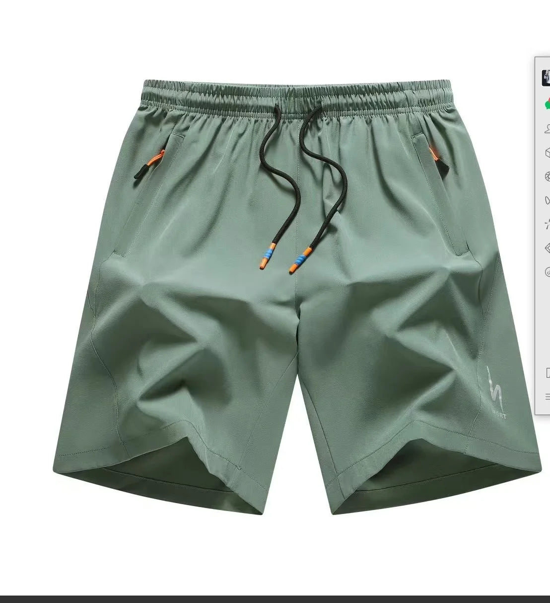 Green shorts with drawstring on a white background