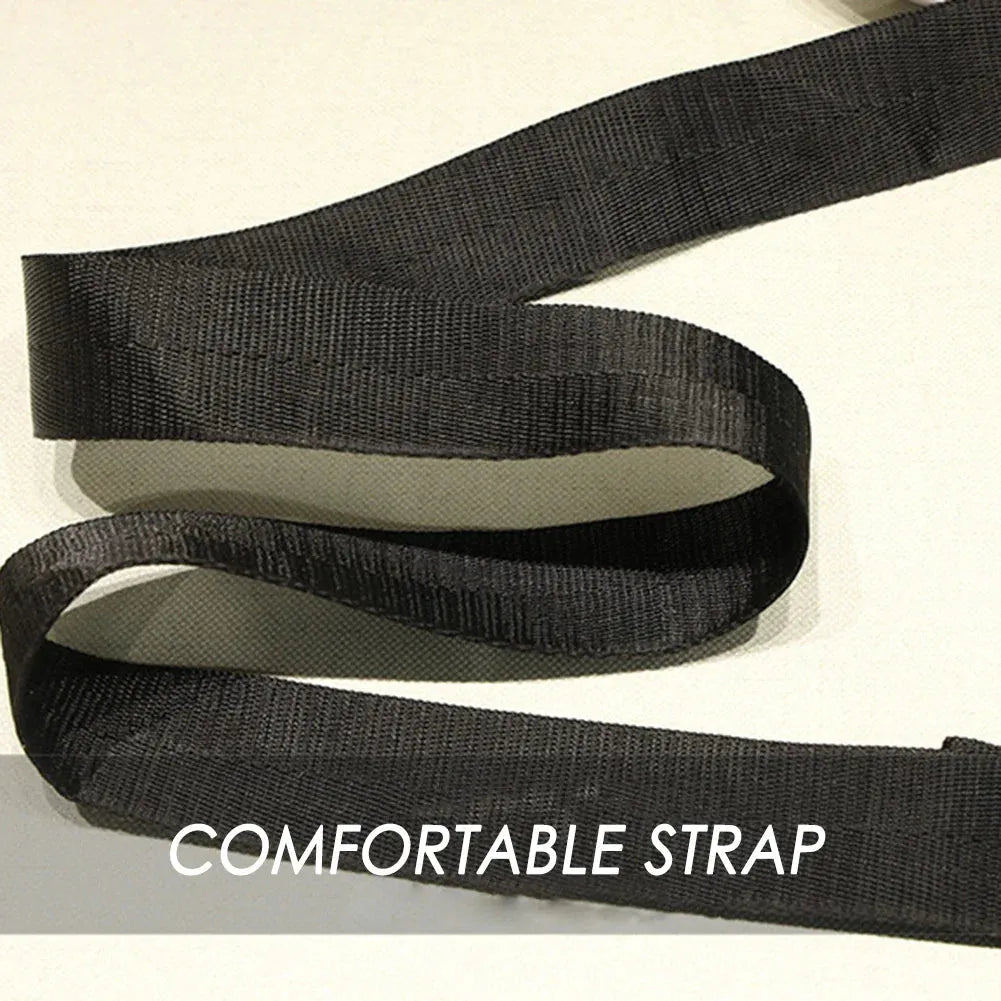 Close-up of black comfortable strap from fitness travel bag, made from durable nylon for long-lasting outdoor use.
