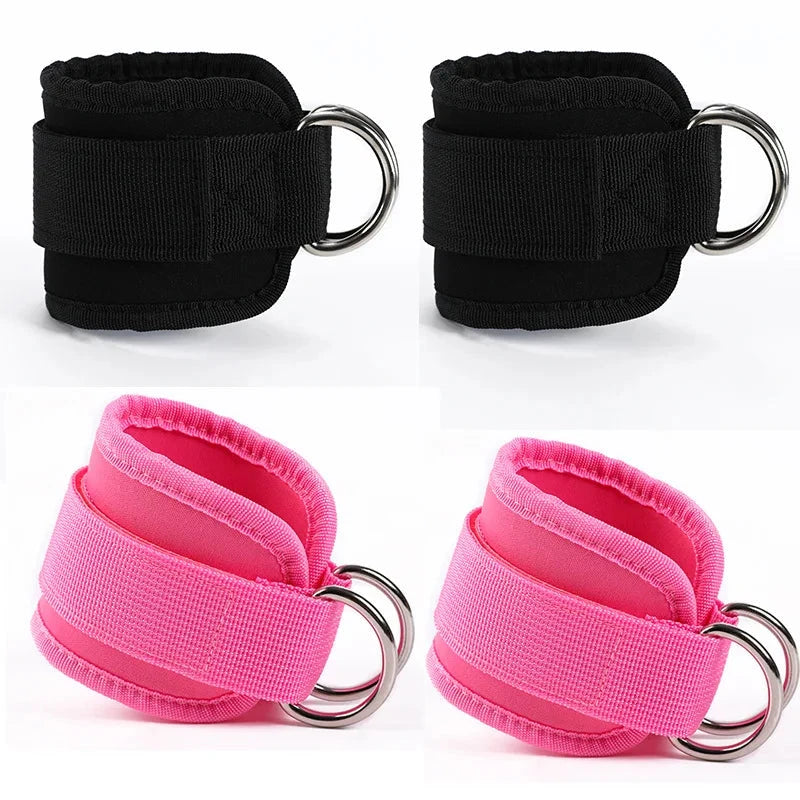 Set of black and pink ankle straps with metal rings for resistance training. Designed for leg muscle toning and fitness routines.