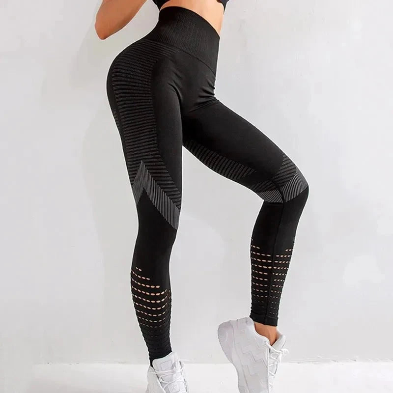 Black Women Fitness Leggings High Waist Seamless Leggings Sportswear with booty lifting and breathable mesh accents.