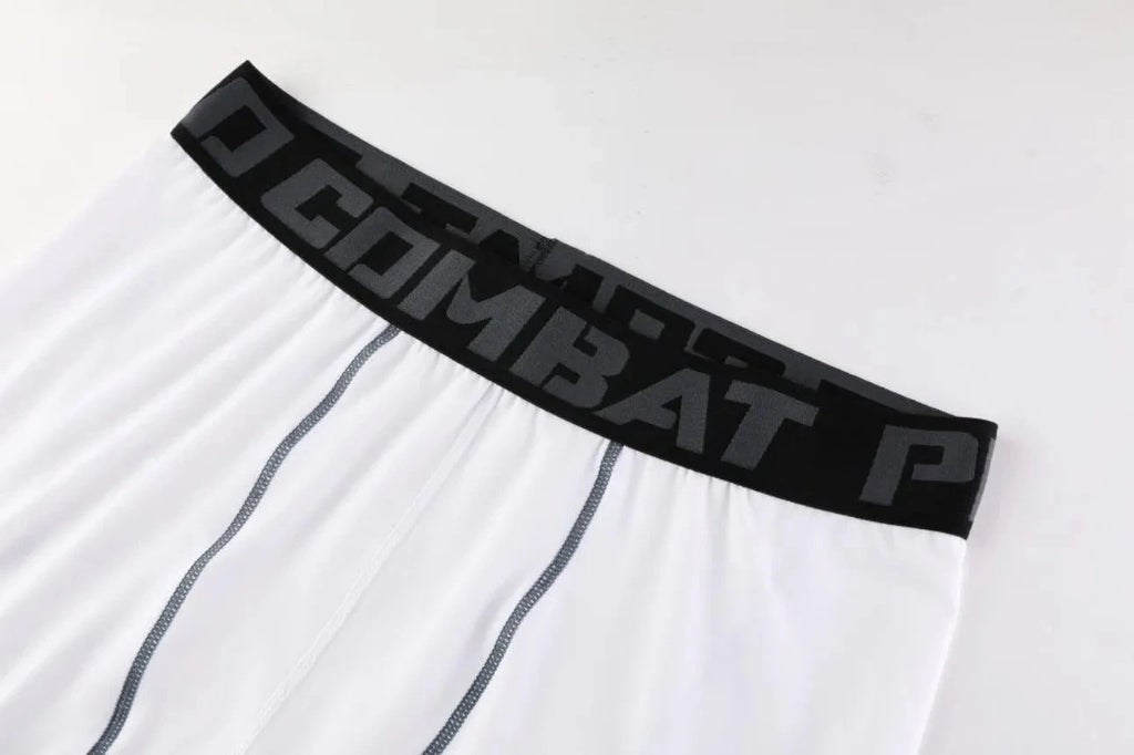 Elastic waistband with 'COMBAT' branding on white Men Bodybuilding Sportswear Clothes Fitness Suit pants for snug fit.