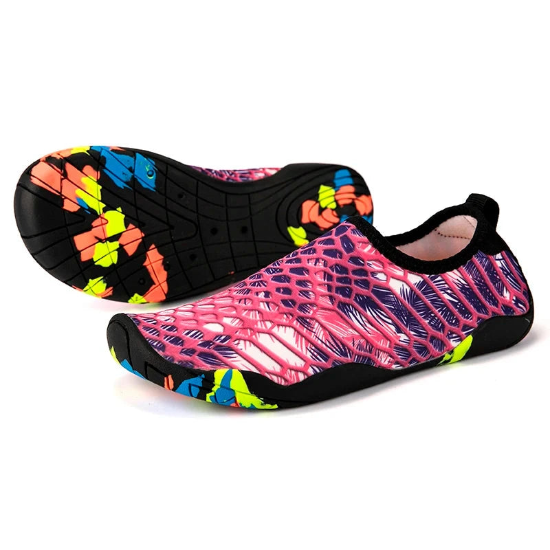 Colorful unisex aqua shoes perfect for beach and outdoor activities, featuring a slip-on design and quick-drying lightweight material.