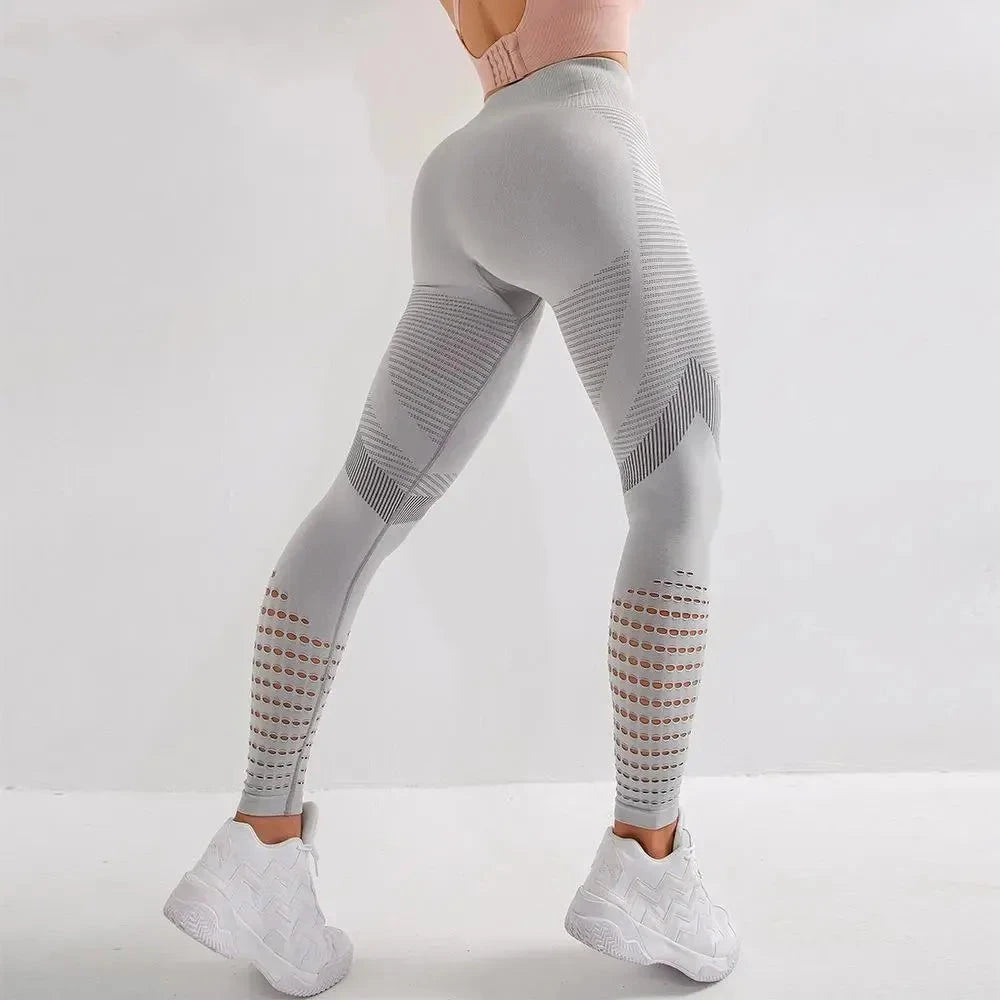 Back view of grey Women Fitness Leggings High Waist Seamless Leggings Sportswear with breathable mesh and sculpting fit.