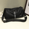 Black portable outdoor fitness gym bag with adjustable strap and LOVE zipper pull, ideal for travel and weekend training.