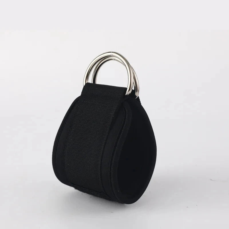 Single black ankle loop with dual metal rings for gym resistance training. Designed for leg toning and glute activation exercises.
