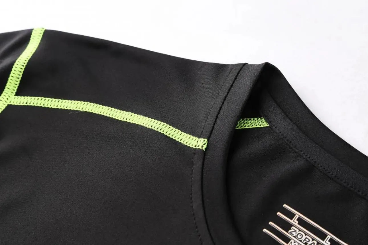 Detailed view of neon green stitching on black Men Bodybuilding Sportswear Clothes Fitness Suit top for durability and style.
