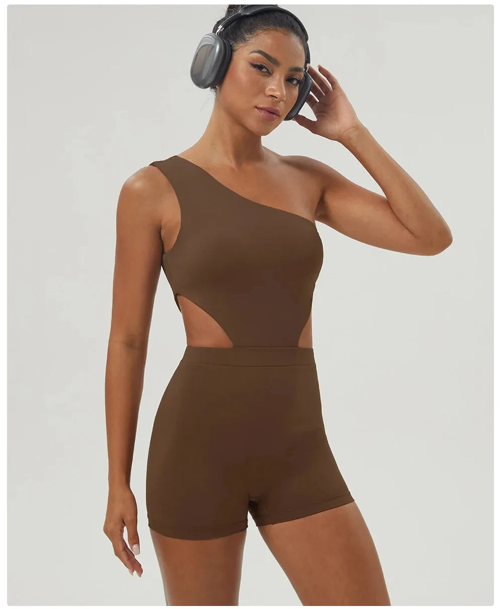 Side view of brown one-shoulder padded jumpsuit for women, designed for fitness and yoga with sculpted fit and stretch fabric.