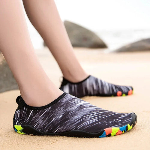 Unisex quick-drying beach aqua shoes for sports, featuring a slip-on design and colorful outsole, perfect for outdoor activities.
